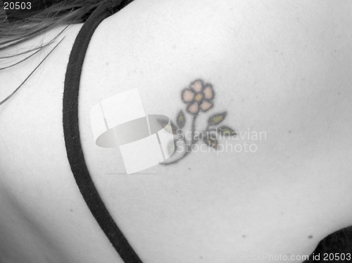 Image of Colored tattoo on a black and white model