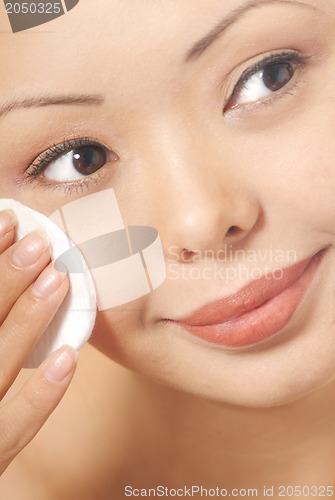 Image of Woman and skin cleaner