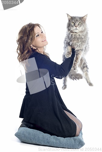 Image of maine coon cat and woman