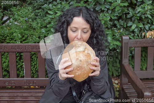 Image of Girl eating bread