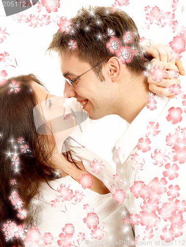 Image of sweet couple with red flowers