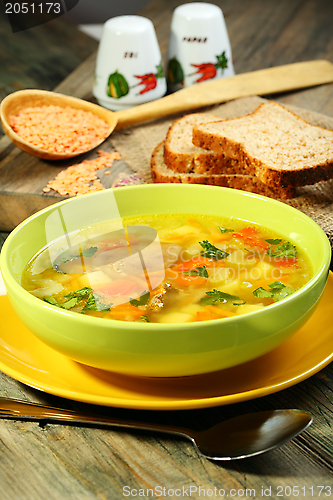 Image of Soup of vegetables and red lentils.