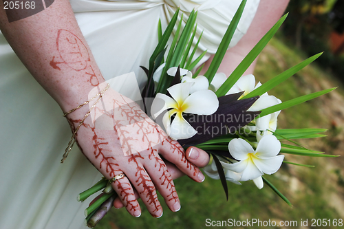 Image of Henna hand design and bouquet