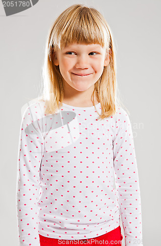Image of Happy young girl looking