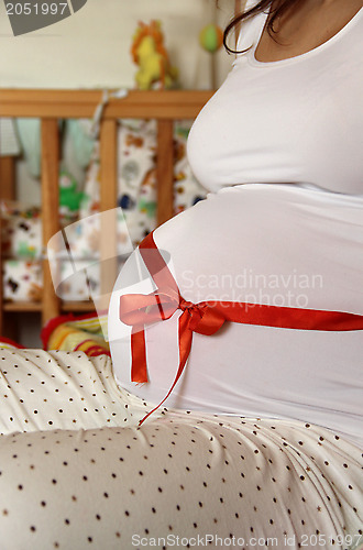 Image of Beautiful pregnant woman tummy  