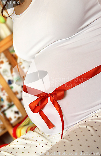 Image of Beautiful pregnant woman tummy  
