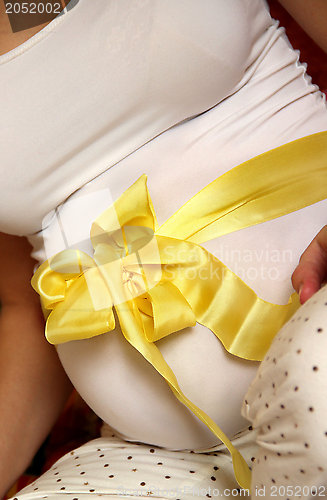 Image of Beautiful pregnant woman tummy  