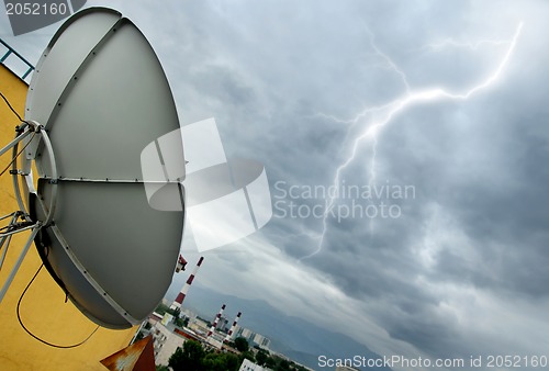 Image of Parabolic antenna and lightning