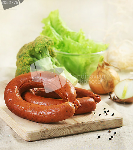 Image of smoked sausages and vegetables