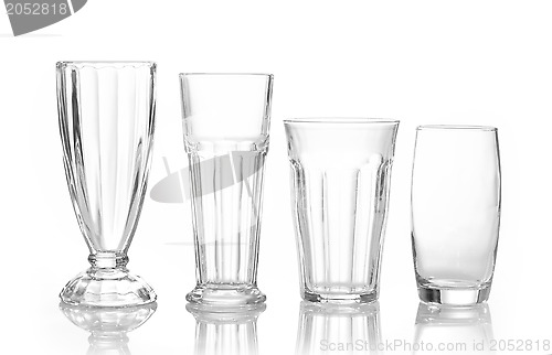 Image of four different juice glasses