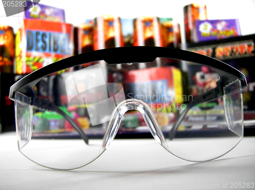 Image of Safety goggles and firework