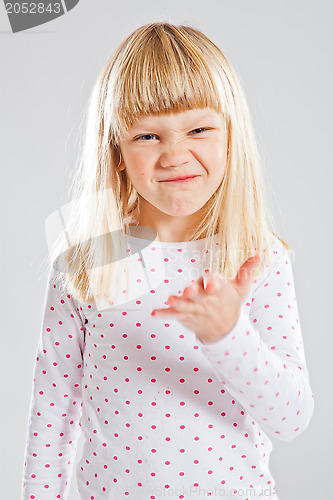 Image of Young girl with funny grin