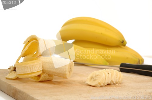 Image of bananas on carving board