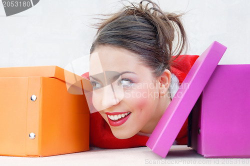 Image of Happy lady with gift boxes