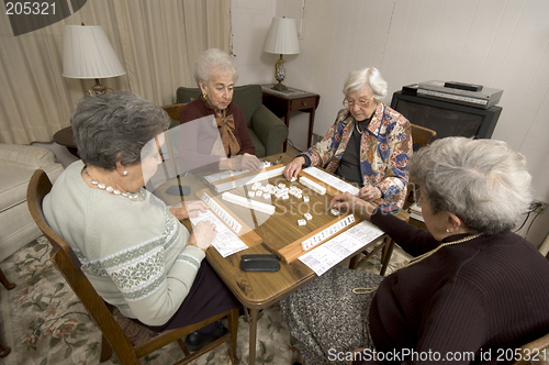 Image of senior woman at the game table