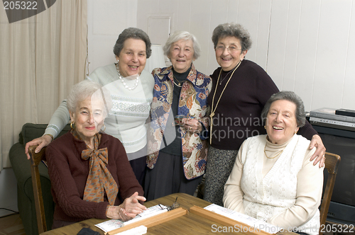 Image of senior woman at the game table