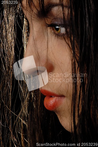 Image of Half-face of woman