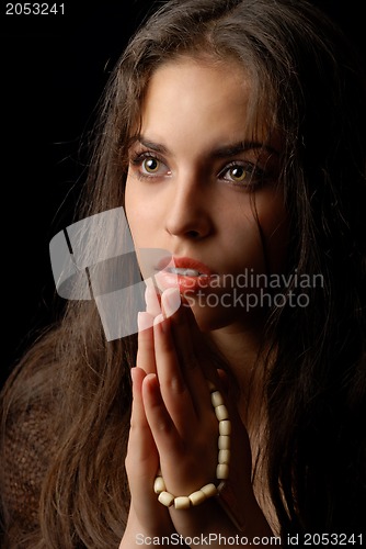 Image of Praying of repentant woman