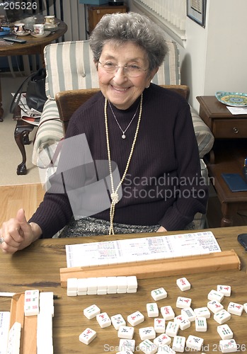 Image of senior woman at the game table