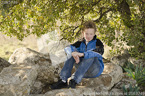 Image of Youngster resting in nature