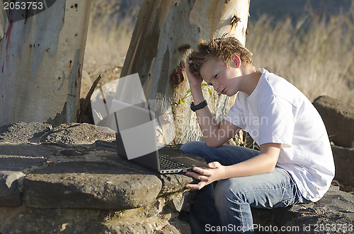 Image of Kid with notebook