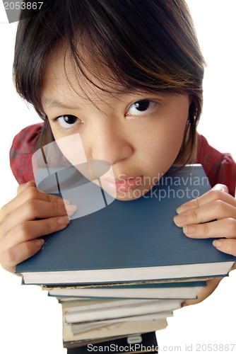 Image of Pretty girl and stack of books