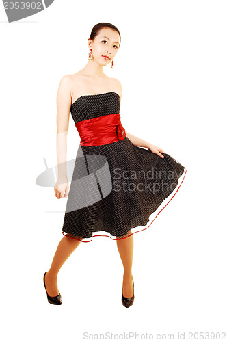 Image of Pretty Asian girl standing.