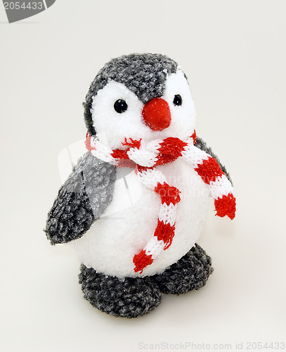 Image of Penguin toy in scarf 