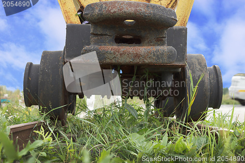 Image of Rusty nonperforming industrial car  in ruins 