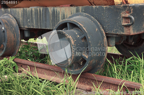 Image of Rusty nonperforming industrial car on rails