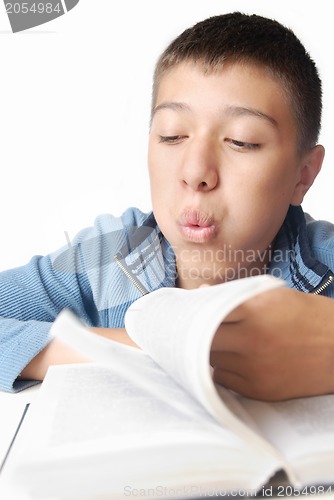 Image of Blowing on the book pages