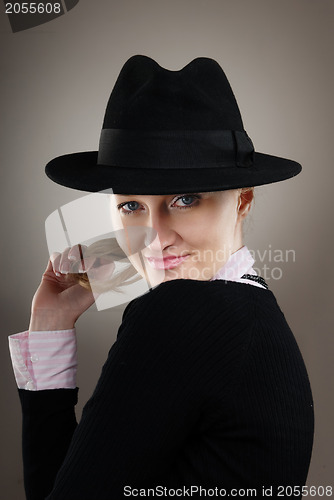 Image of Coquette in black hat