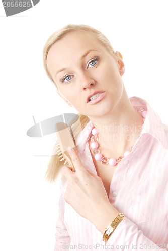 Image of Woman and rake-comb