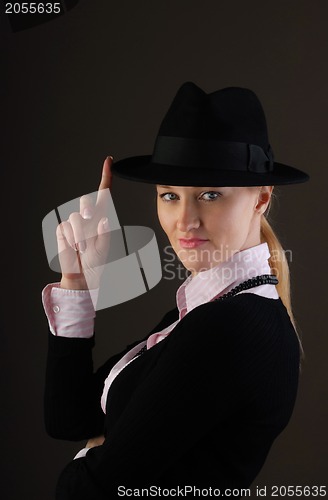 Image of Black hat and pink shirt