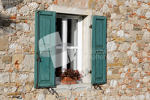 Image of Window with Green Shutters