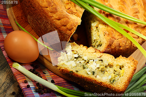 Image of Pie with egg and onion stuffing.