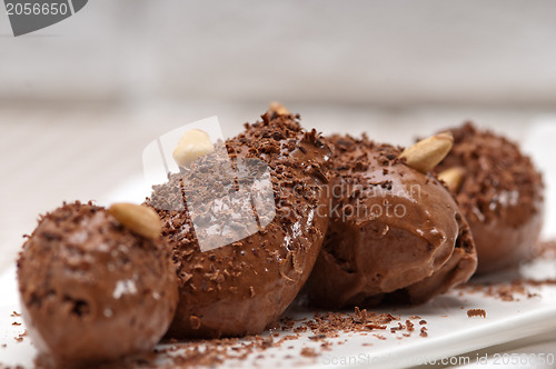 Image of chocolate mousse quenelle dessert