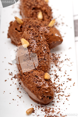 Image of chocolate mousse quenelle dessert