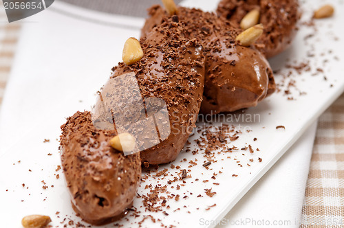 Image of chocolate mousse quenelle dessert