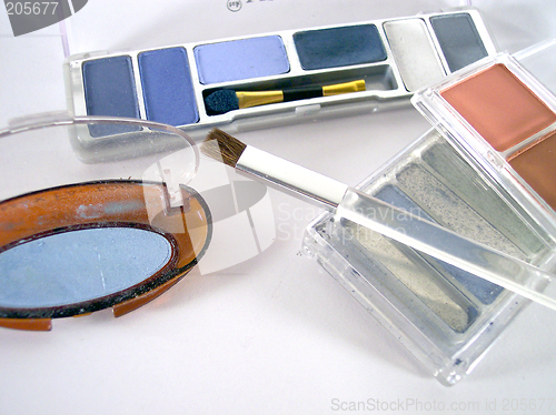 Image of make-up cases and brushes