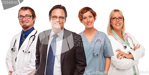 Image of Smiling Businessman with Doctors and Nurses