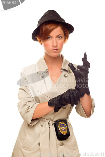 Image of Female Detective With Badge and Gloves In Trench Coat on White