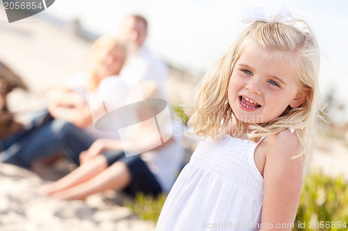 Image of Adorable Little Blonde Girl Having Fun At the Beach