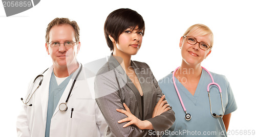 Image of Young Mixed Race Woman with Doctors and Nurses Behind