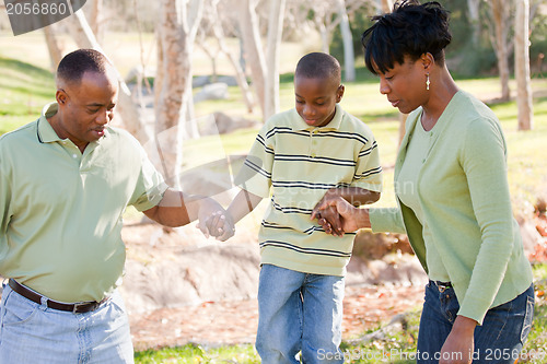Image of Beautiful African American Family Playing Outside