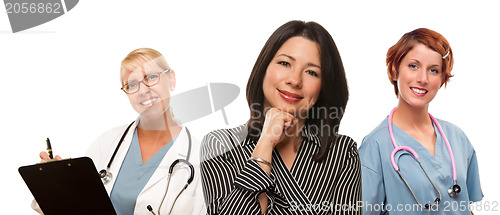 Image of Hispanic Woman with Female Doctors and Nurses