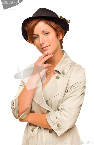 Image of Attractive Red Haired Girl Wearing a Trench Coat and Hat