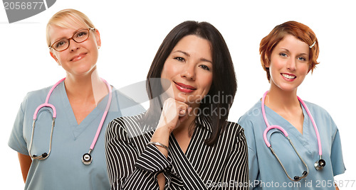 Image of Hispanic Woman with Female Doctors and Nurses