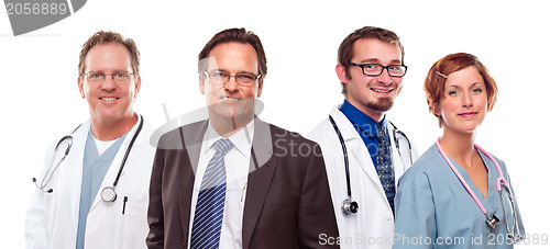 Image of Smiling Businessman with Doctors and Nurses