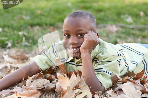 Image of Young African American Boy Playing in the Park